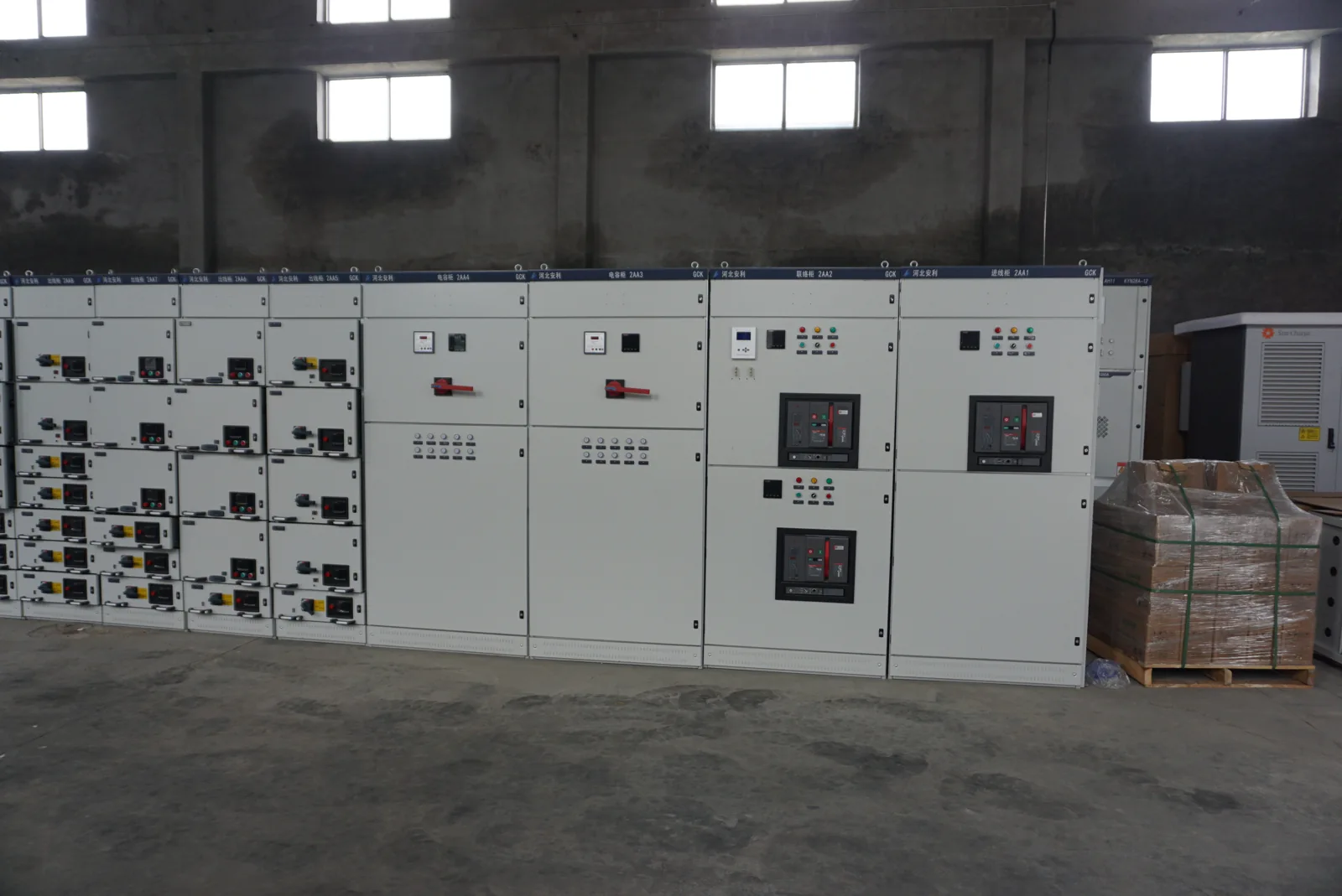 Electrical cabinet assemblies arranged on the workshop floor