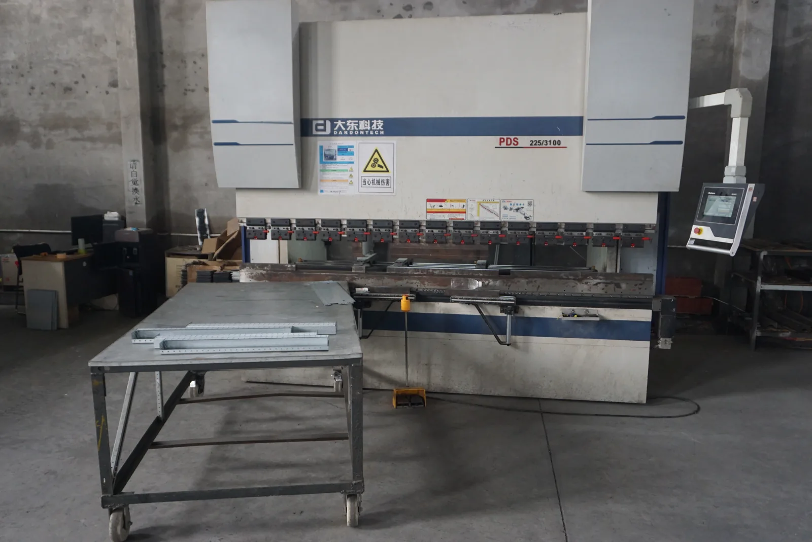 Sheet-metal forming equipment used in cabinet fabrication