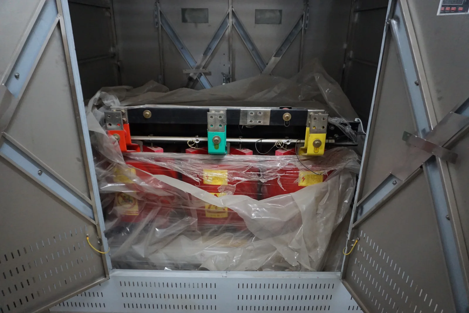 Transformer mounted inside an electrical cabinet
